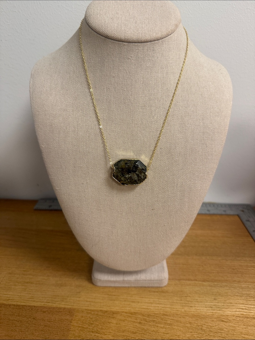 Stone pendant necklace on dainty gold tone chain